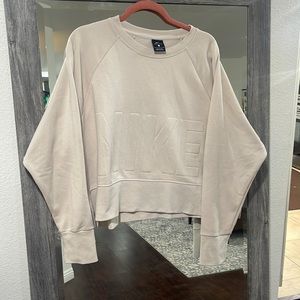 W NIKE TOP VERSA CREW NFS